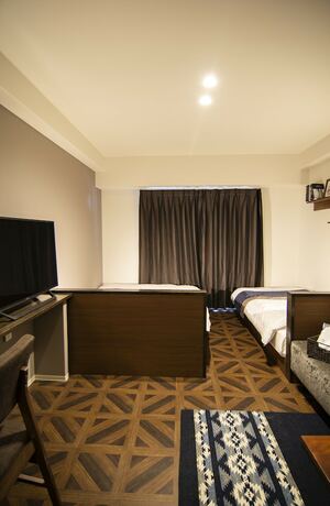 Imagen de la habitación del Hotel E-stay Ebisu. Foto 25