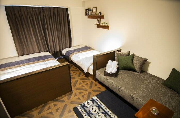 Imagen de la habitación del Hotel E-stay Ebisu. Foto 26