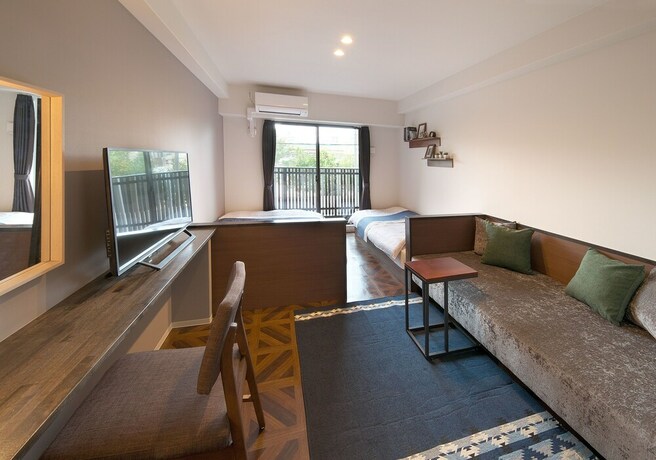 Imagen de la habitación del Hotel E-stay Ebisu. Foto 30