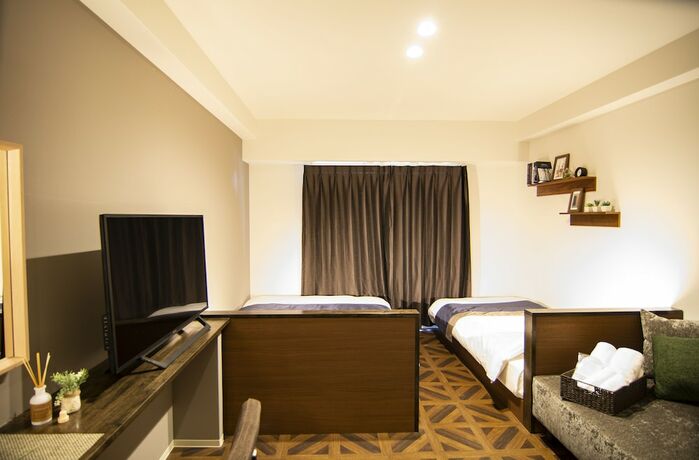 Imagen de la habitación del Hotel E-stay Ebisu. Foto 32