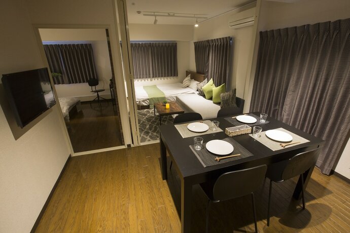 Imagen de la habitación del Hotel E-stay Namba. Foto 14