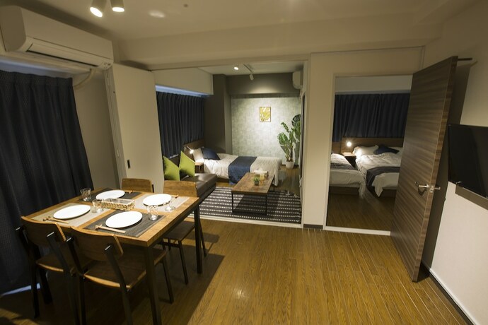 Imagen de la habitación del Hotel E-stay Namba. Foto 17