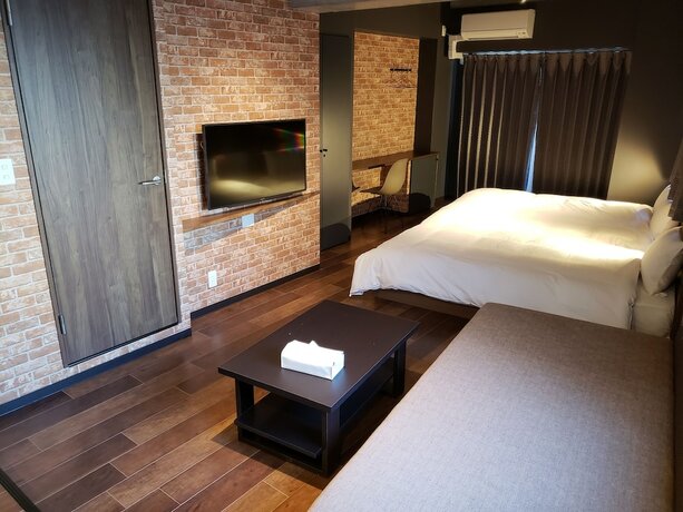 Imagen de la habitación del Hotel E-stay Namba. Foto 20