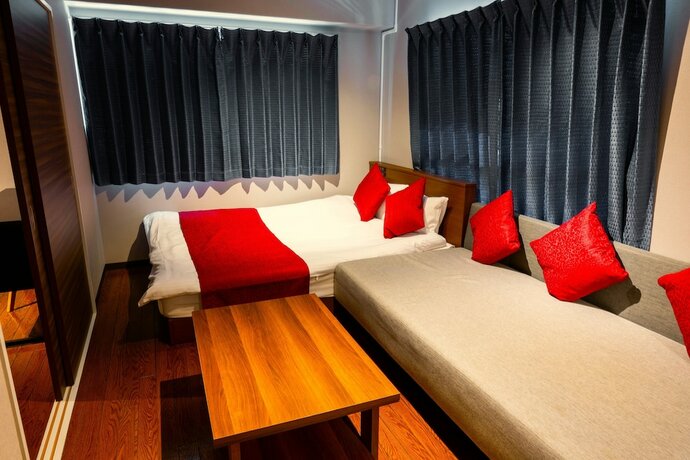 Imagen de la habitación del Hotel E-stay Namba. Foto 25