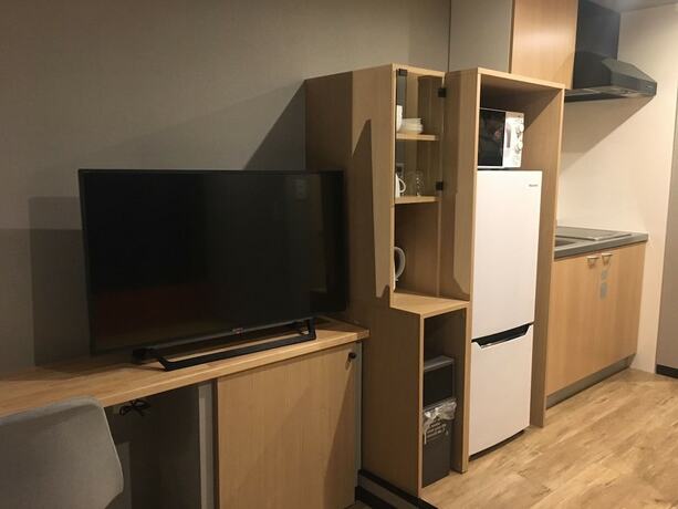 Imagen de la habitación del Hotel E-stay Namba. Foto 27