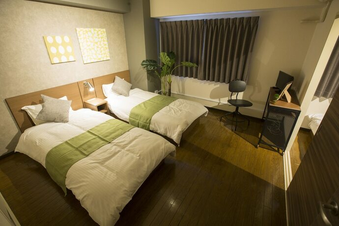 Imagen de la habitación del Hotel E-stay Namba. Foto 28