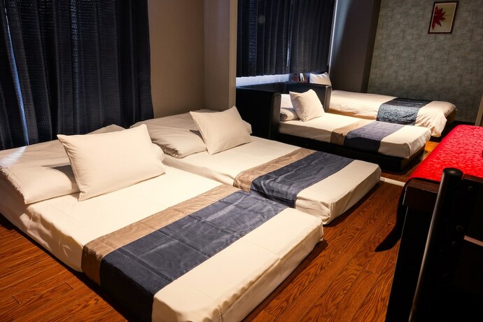 Imagen de la habitación del Hotel E-stay Namba. Foto 32