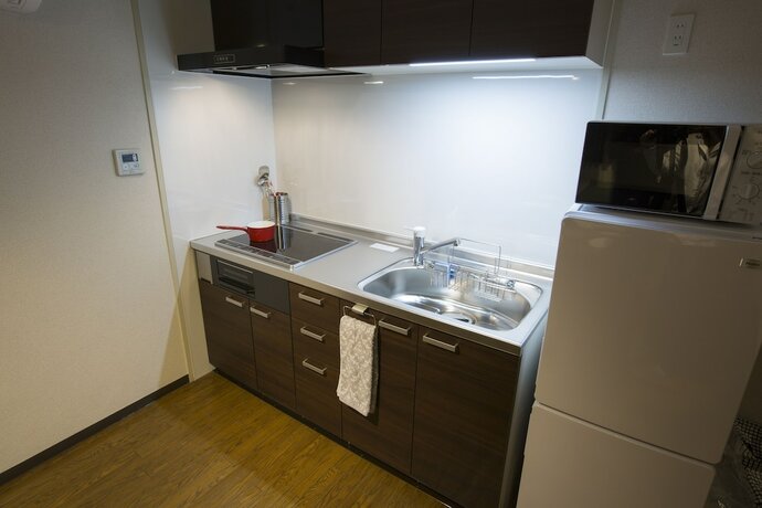Imagen de la habitación del Hotel E-stay Namba. Foto 33