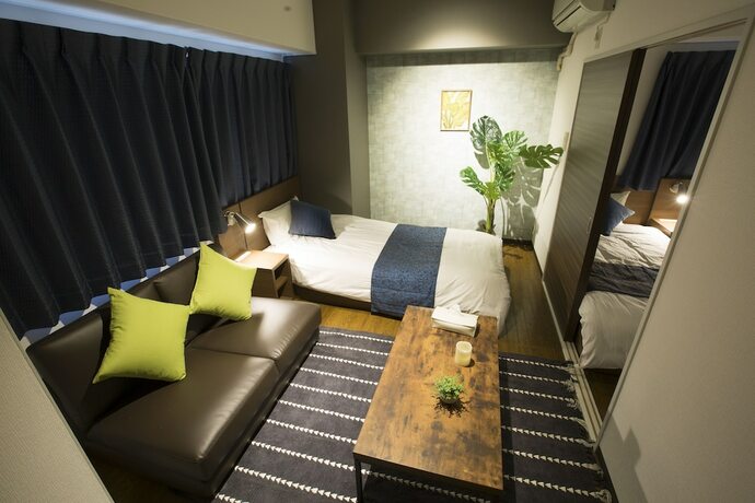 Imagen de la habitación del Hotel E-stay Namba. Foto 34