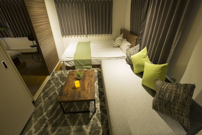 Imagen de la habitación del Hotel E-stay Namba. Foto 36