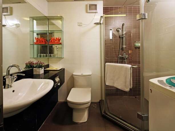 Imagen de la habitación del Hotel Estay Residence - Guangzhou Peace World Plaza. Foto 14