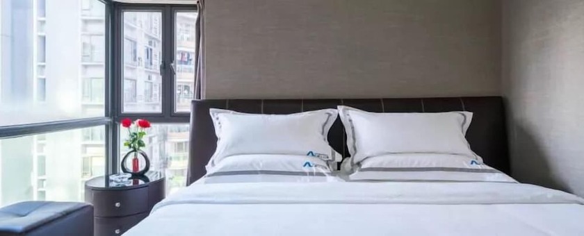 Imagen de la habitación del Hotel Estay Residence - Guangzhou Peace World Plaza. Foto 15