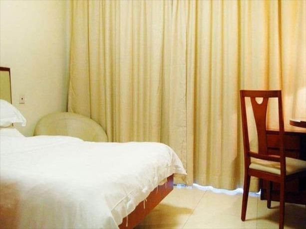 Imagen de la habitación del Hotel Estay Residence - Guangzhou Peace World Plaza. Foto 16
