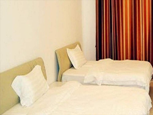 Imagen de la habitación del Hotel Estay Residence - Guangzhou Peace World Plaza. Foto 19