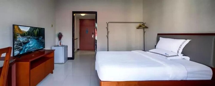 Imagen de la habitación del Hotel Estay Residence - Guangzhou Peace World Plaza. Foto 22