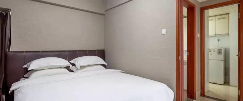 Imagen de la habitación del Hotel Estay Residence - Guangzhou Peace World Plaza. Foto 23