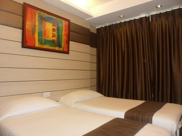 Imagen de la habitación del Hotel Esteem. Foto 21