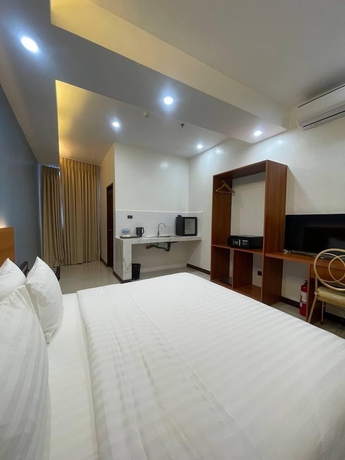 Imagen de la habitación del Hotel Estela\'s and Event Center. Foto 15