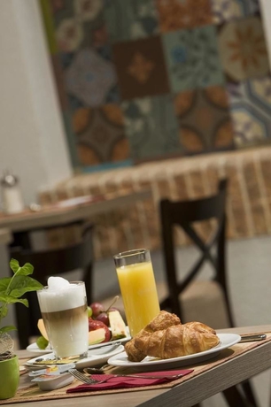 Imagen del bar/restaurante del Hotel Estilo by Mellow Mood Hotels. Foto 2