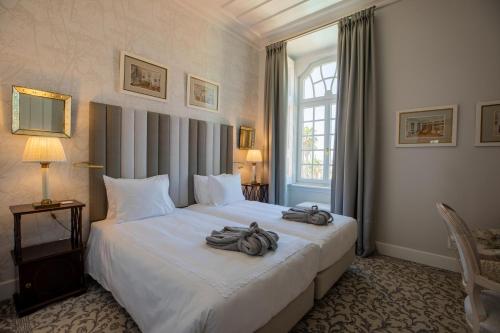 Imagen de la habitación del Hotel Estoril Vintage. Foto 19