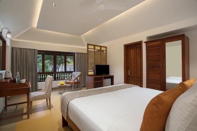 Imagen de la habitación del Hotel Estuary Sarovar Portico Poovar. Foto 8