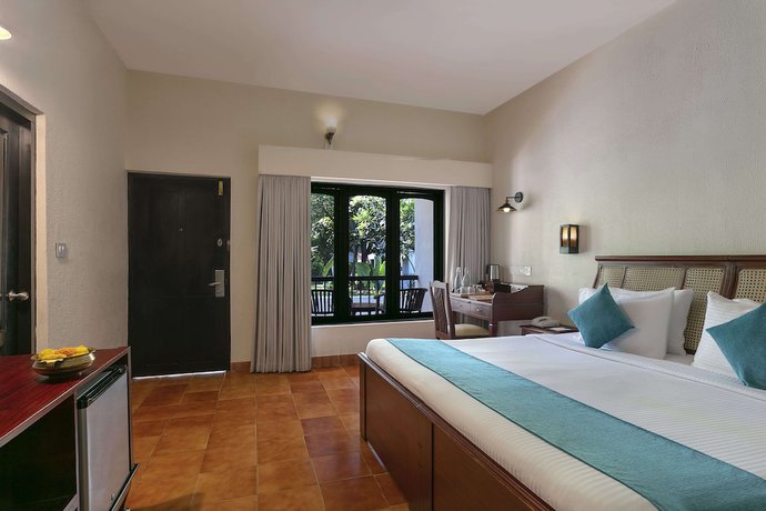 Imagen de la habitación del Hotel Estuary Sarovar Portico Poovar. Foto 12