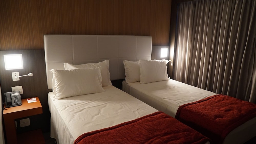 Imagen de la habitación del Hotel Esuites Recreio Shopping. Foto 13