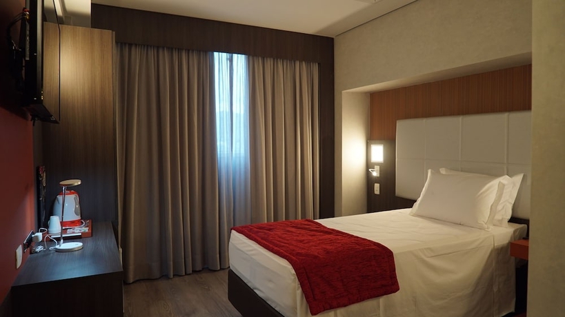 Imagen de la habitación del Hotel Esuites Recreio Shopping. Foto 15