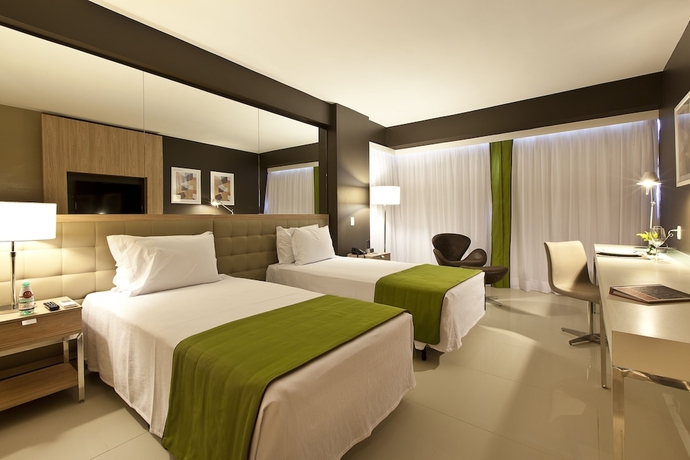 Imagen de la habitación del Hotel Esuites Savassi Toscanini. Foto 2