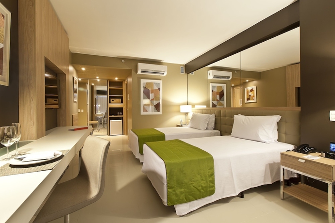 Imagen de la habitación del Hotel Esuites Savassi Toscanini. Foto 7