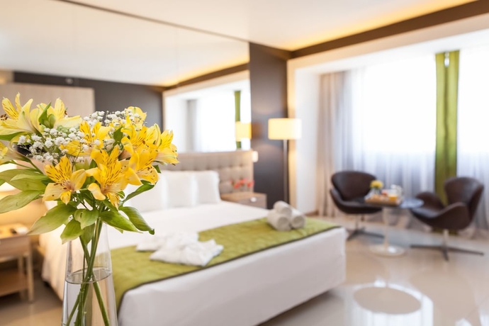 Imagen de la habitación del Hotel Esuites Savassi Toscanini. Foto 9