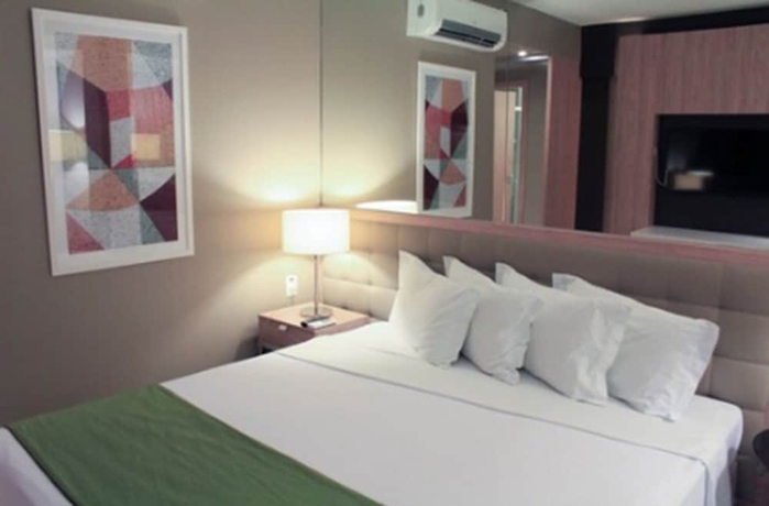 Imagen de la habitación del Hotel Esuites Savassi Toscanini. Foto 10
