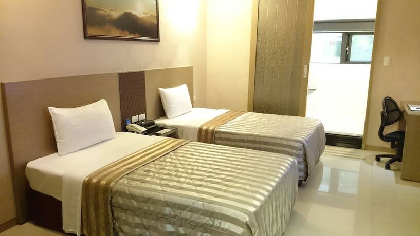 Imagen de la habitación del Hotel E.sun Villa. Foto 18