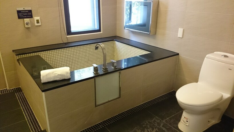 Imagen de la habitación del Hotel E.sun Villa. Foto 19