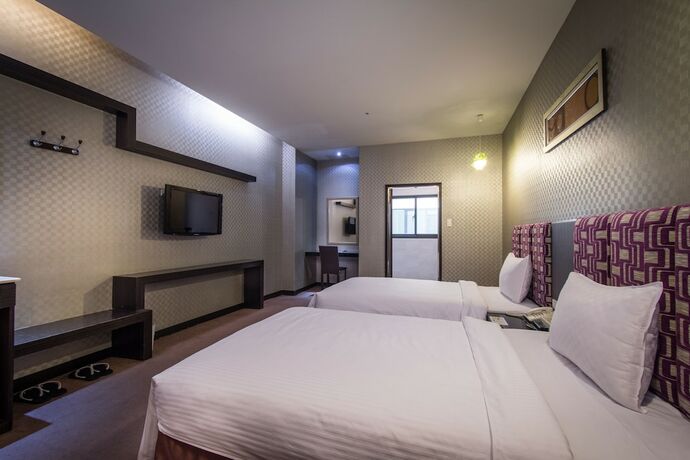 Imagen de la habitación del Hotel E.sun Villa. Foto 23