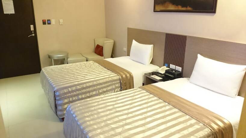 Imagen de la habitación del Hotel E.sun Villa. Foto 26