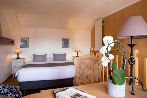 Imagen de la habitación del Hotel Et Spa Le Lion D'or. Foto 5