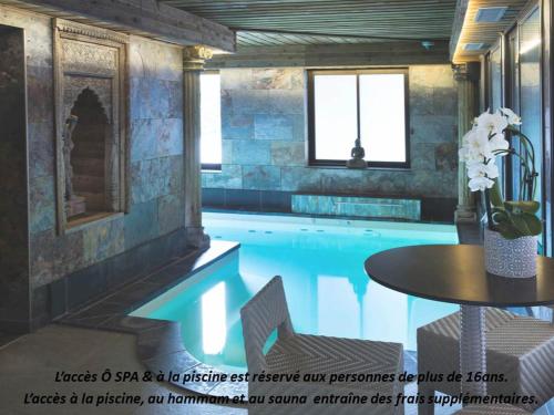 Imagen de la habitación del Hotel Et Spa Le Lion D'or. Foto 6