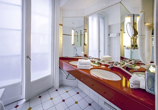 Imagen de la habitación del Hotel Etats Unis Opera. Foto 7