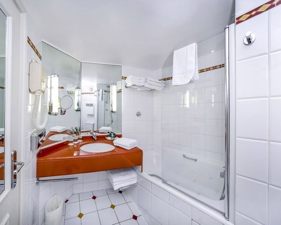 Imagen de la habitación del Hotel Etats Unis Opera. Foto 8