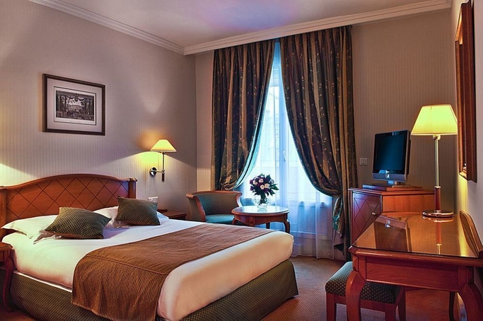 Imagen de la habitación del Hotel Etats Unis Opera. Foto 11