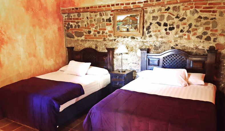 Imagen de la habitación del Hotel Eterna Primavera Antigua. Foto 6