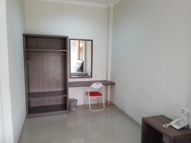 Imagen de la habitación del Hotel Ethan. Foto 13