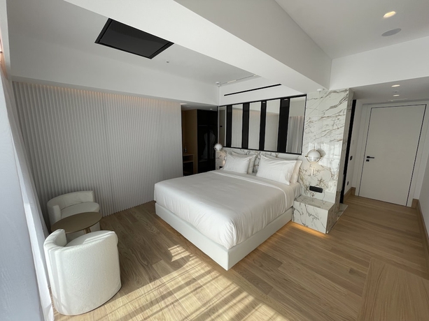 Imagen de la habitación del Hotel Ethereal White Resort. Foto 11