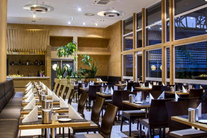 Imagen del bar/restaurante del Hotel Eto Park Business and Stadium. Foto 8