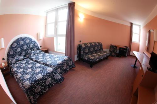 Imagen de la habitación del Hotel Etoile Du Nord, Arensod. Foto 9