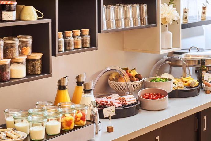 Imagen del bar/restaurante del Hotel Etoile Saint Ferdinand By Happyculture. Foto 2