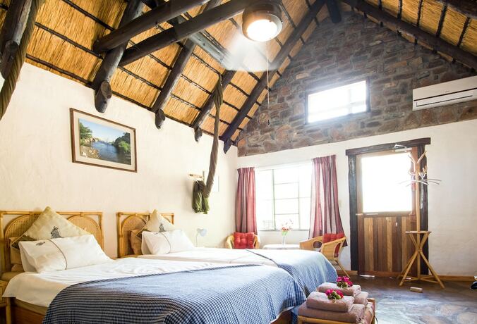 Imagen de la habitación del Hotel Etusis Lodge. Foto 16