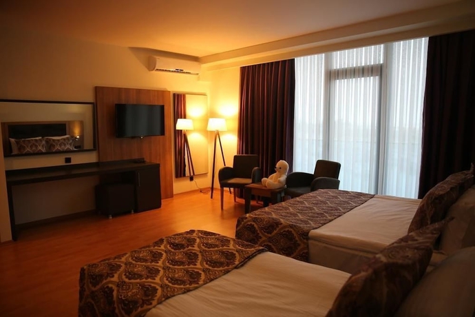 Imagen de la habitación del Hotel Euphoria Apartments and Residence Batumi. Foto 8
