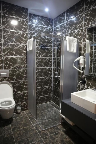 Imagen de la habitación del Hotel Euphoria Apartments and Residence Batumi. Foto 13